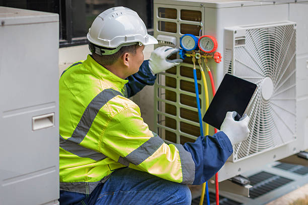 Professional Hvac technician working in DeKalb, IL